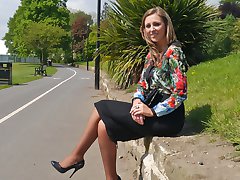 Hot brunette Debbie shows her nice arse in a tight skirt and tall black stiletto heels