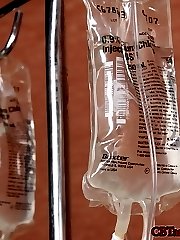Nurse Goddess Soma decides slave jimmy needs a "set of balls". So to give him a set of balls, she pierces his ballsack with an IV catheter and proceeds to inject his measly ballsack with 500 ccs of saline, until they are a proper size of her liking, the size of a grapefruit.