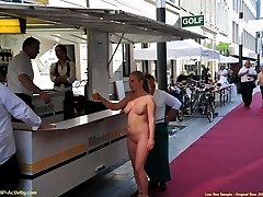 Sexy babe flashes her tits in streets