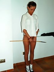 Cute teen in the corner with brutally caned bottom - severe stripes and welts