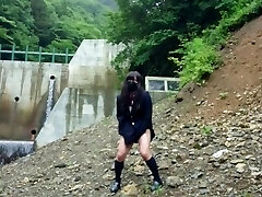 Adorable Transgender pops lewdly as she exposes herself at a dam deep in the mountains.