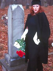 Busty curvy redhead flashes in the cemetery
