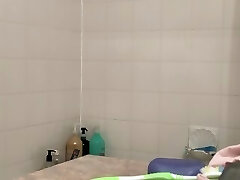 Sweaty Asian teen Pruning legs in the shower after Gym - REAL SPYCAM part 2