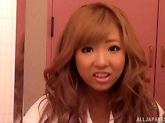 Sexy ginger-haired Asian with biug tits in thong gets cooch waxed