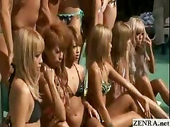 Tanned group of Japanese nubiles stance for a topless pool photo shoot