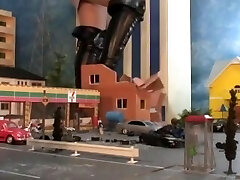 sexy giantess trampling city in high heels and boots