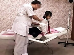 Pigtailed Asian girl with perky tits gets massaged and f
