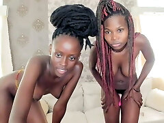 Two African girls jerking