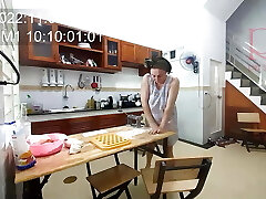 Ravioli Time! A naked housekeeper works in the motel kitchen. Depraved housekeeper works in the kitchen without panties.