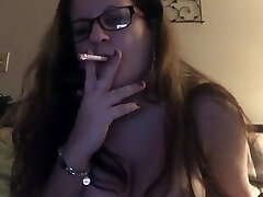 Smoking Cougar!! 36dd tits out smoking and frolicking Xbox! Smokin fetish!!
