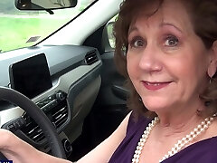 Brunette Demi wearing black lingerie pleasuring her shaved cunt