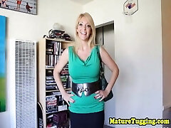 Busty Cougar facialized after wanking cock