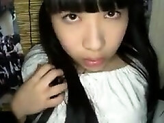 Pigtailed Asian teen in tight milky panties flashes her sha