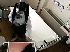 Cute Asian schoolgirl with pigtails has a medic fingering 