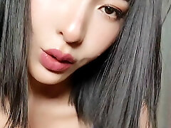 Famous Chinese actress Elise in blue stockings lingerie. DD natural milky japanese tits.
