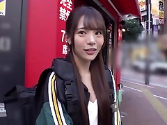 A petite Chinese with a vibrator in her pussy walks around the city and gets hard hump.