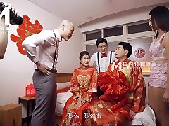 Sweet asian teenager gets shared by two lustful guys in bed after the wedding