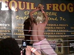 Kinky blonde lady flashes her beautiful tits in a club