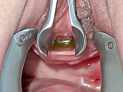 pee slot fucking with toothbrush and insertion of lengthy metal chain into her bladder