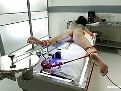 Booty siren gets bondage and fucked by a machine