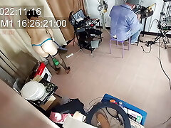 A naked maid is cleaning up in an bimbo IT engineer's office. Real camera in office. 