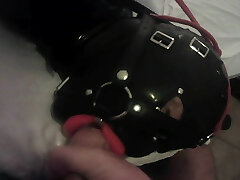 TEASER Laura is hog-tied in latex catsuite and high heels, throated with a lip open mouth gag POV