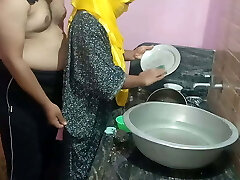 Sister-in-law has sex with stepbrother in the kitchen