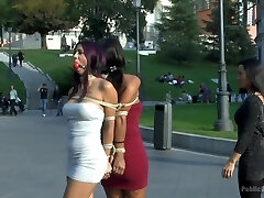 Coral Joice and Julia De Lucia roped up in public with ball gags