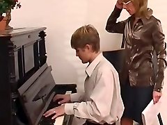  piano lecturer dominates her student