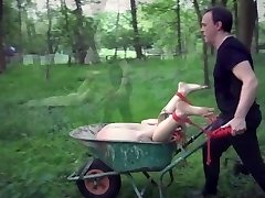 Young slave get corded up and fucked in the garden
