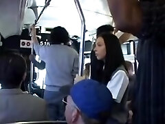 Brunette babe is groped then unloads on a Japanese bus