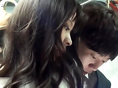 Asian sweetheart in dark-hued pantyhose is sucking dick and getting fucked in a public bus