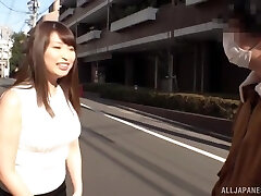 Amateur Japanese babe Akiyama Shouko teases with her ample boobs