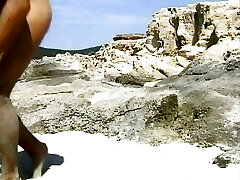 Superb German doll with dark hair gets a firm anal bang at the beach