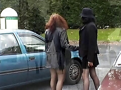Two babes flashing their tits and honeypot in public place