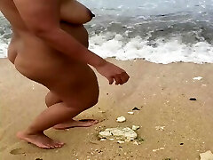 Bashful Asian Nude on Beach