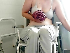 Paraplegic brunette Purplewheelz British milf urinating in the shower