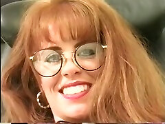 Hawt breasty secretary in glasses masturbates her wet slit