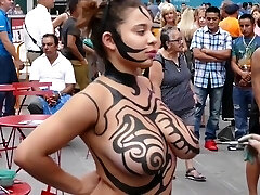 Big tits dame public body painting