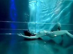 Bond Nymph, underwater stunts, nerd girl, high high-heeled shoes glamor and underwater swimming retro style