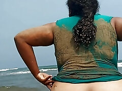 Preggo slut Wife Shows Her pussy In Public Beach