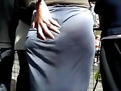 Street voyeur filmed a sexy hoe with nice butt