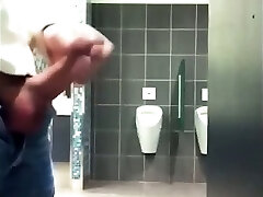 Hung Uncircumcised Cock in Public Toilet