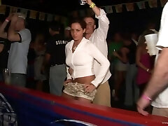 Kinky blonde chick shows her beautiful tits in a club