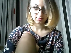Beautiful girl with glasses easily knuckle her pussy