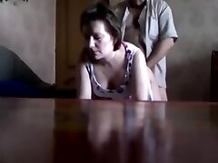Covert cam showing a Russian unfaithful wife fucked doggystile by her lover.