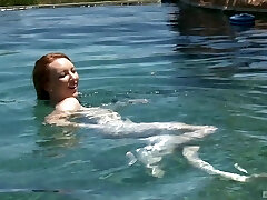 Sandy-haired teen babe Katy Kiss sucks and pummels by the pool outdoors