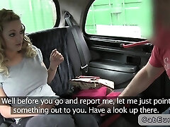 Busty British blonde humping in fake taxi