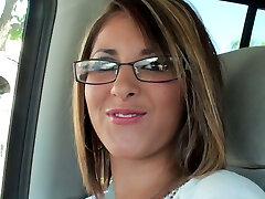 Seductive blond damsel wearing glasses leads dirty talks in the car