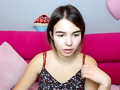 Little brunette posing on webcam